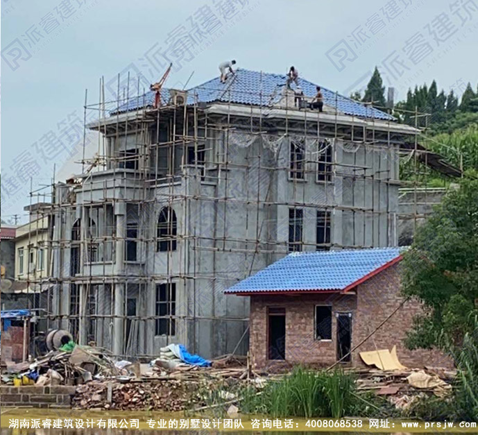 pr271157平三层农村自建别墅实景图.jpg
